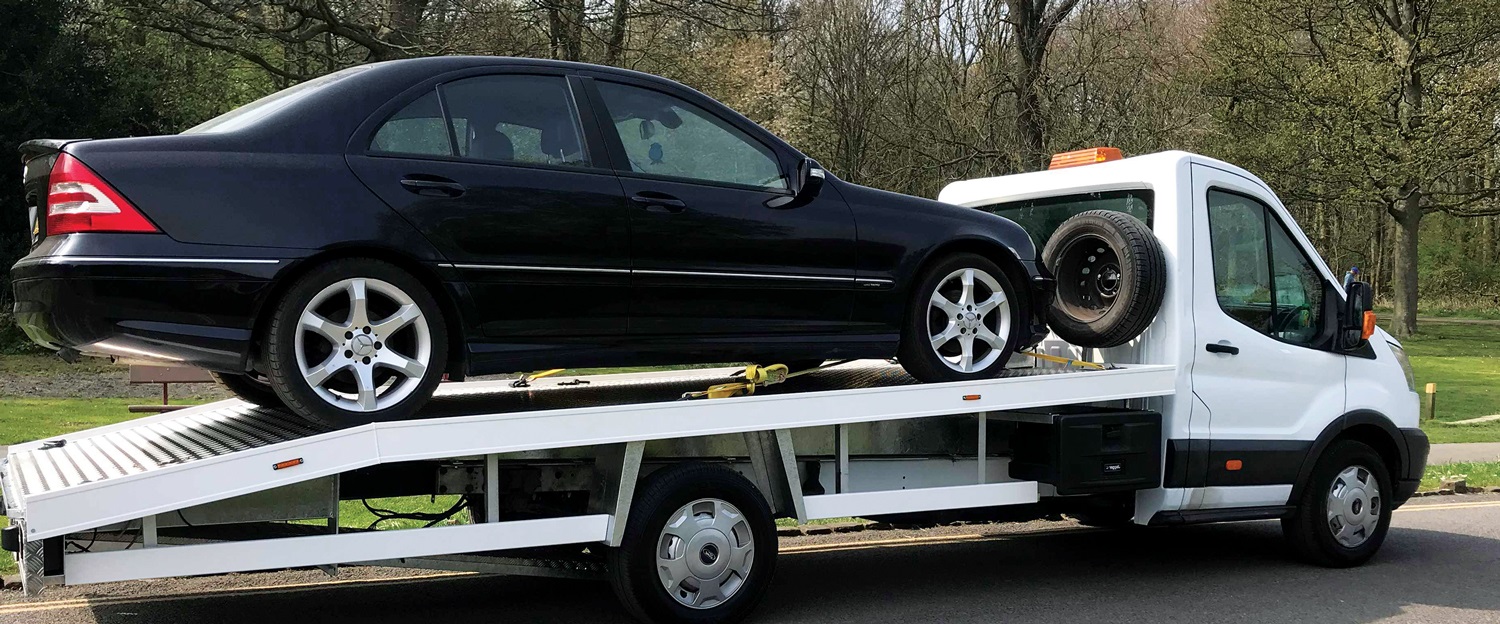 Rescue Me 24HR Recovery truck on road
